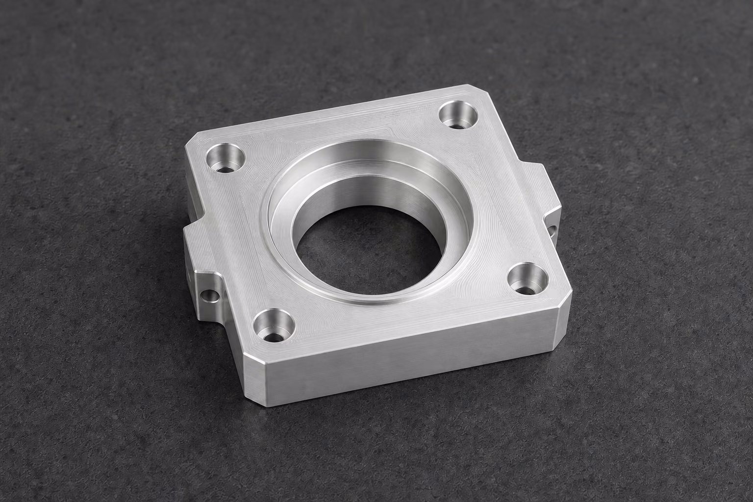 The same 6061 aluminum actuator housing with a natural silver Type II clear anodized finish and visible machining character.