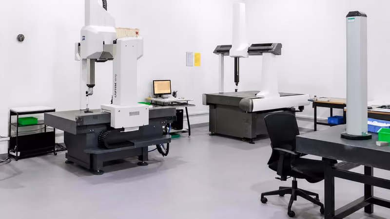 Metrology laboratory with coordinate measuring and optical inspection equipment
